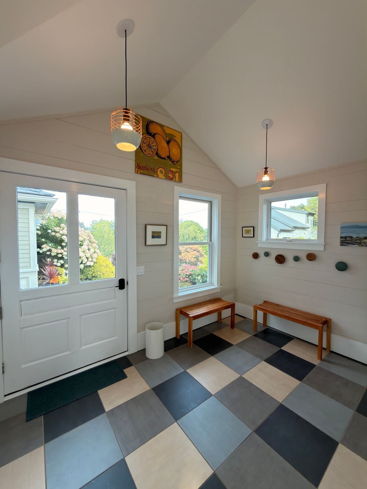 Mudroom with benches and hydrangea view