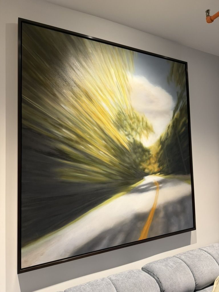 Painting of a road blurring into yellow trees