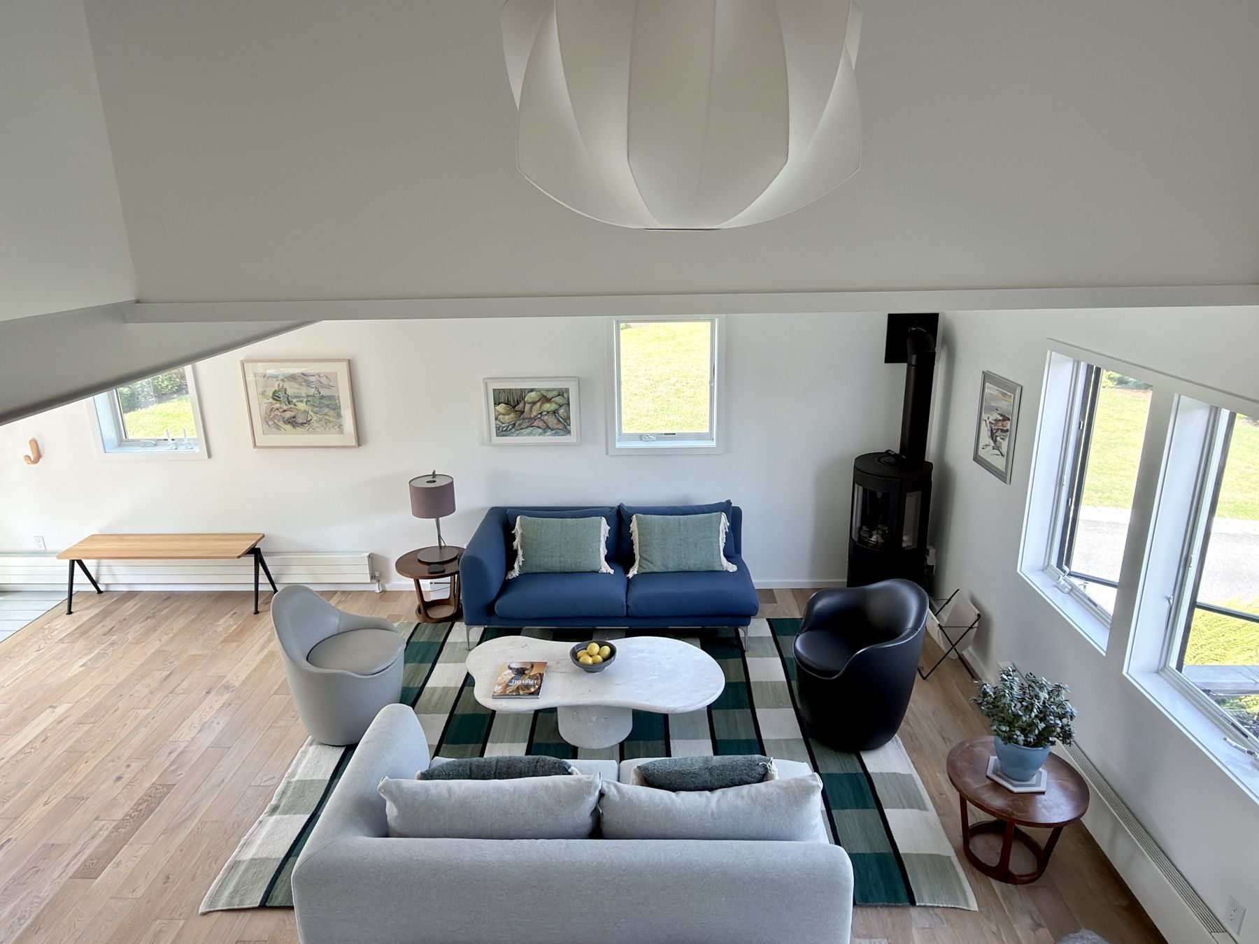 Schoolhouse sitting room with checked rug