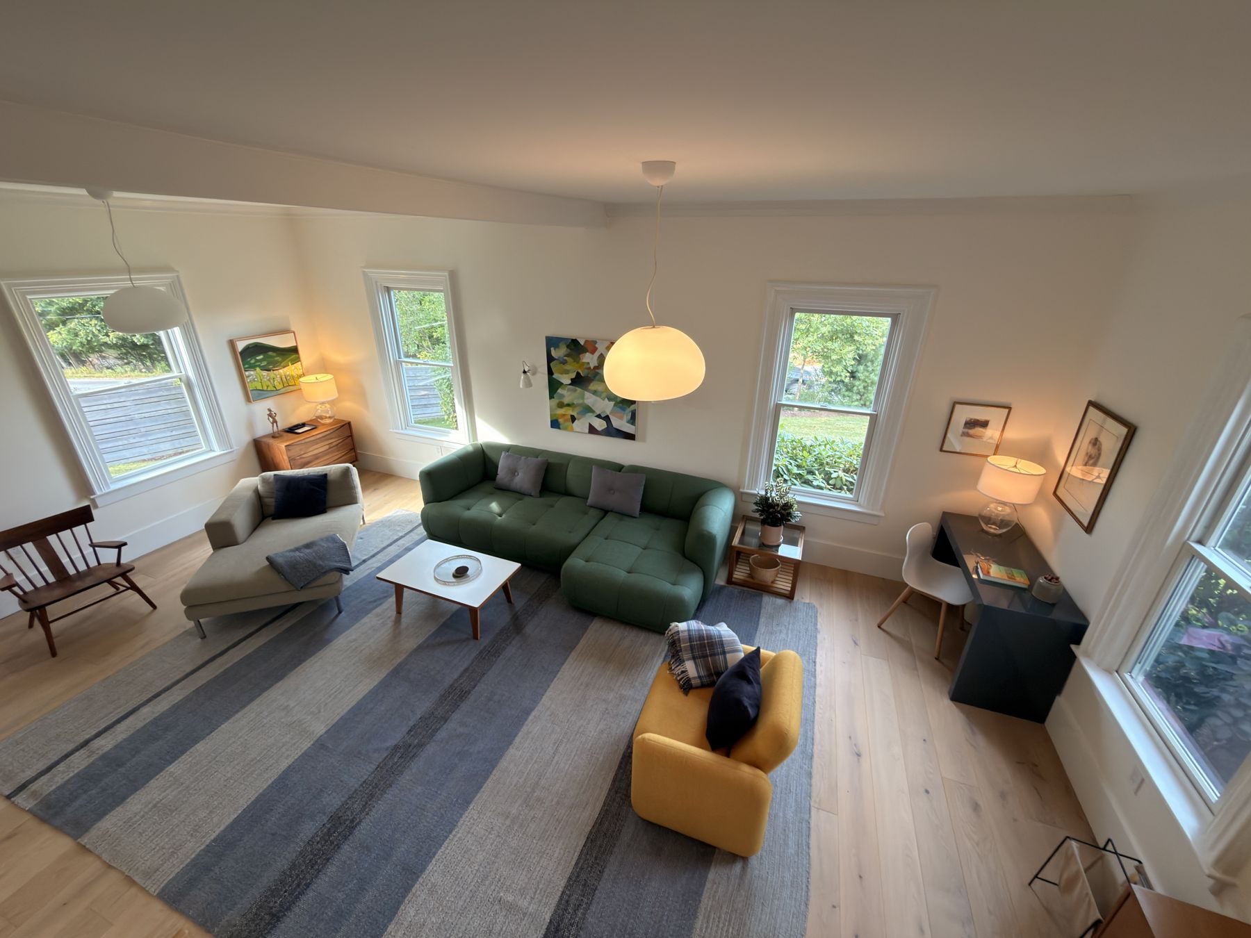 Living room with green sofa