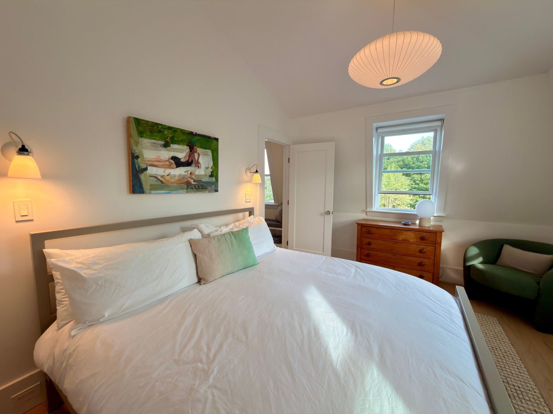 Upstairs king bedroom with reading nook beyond