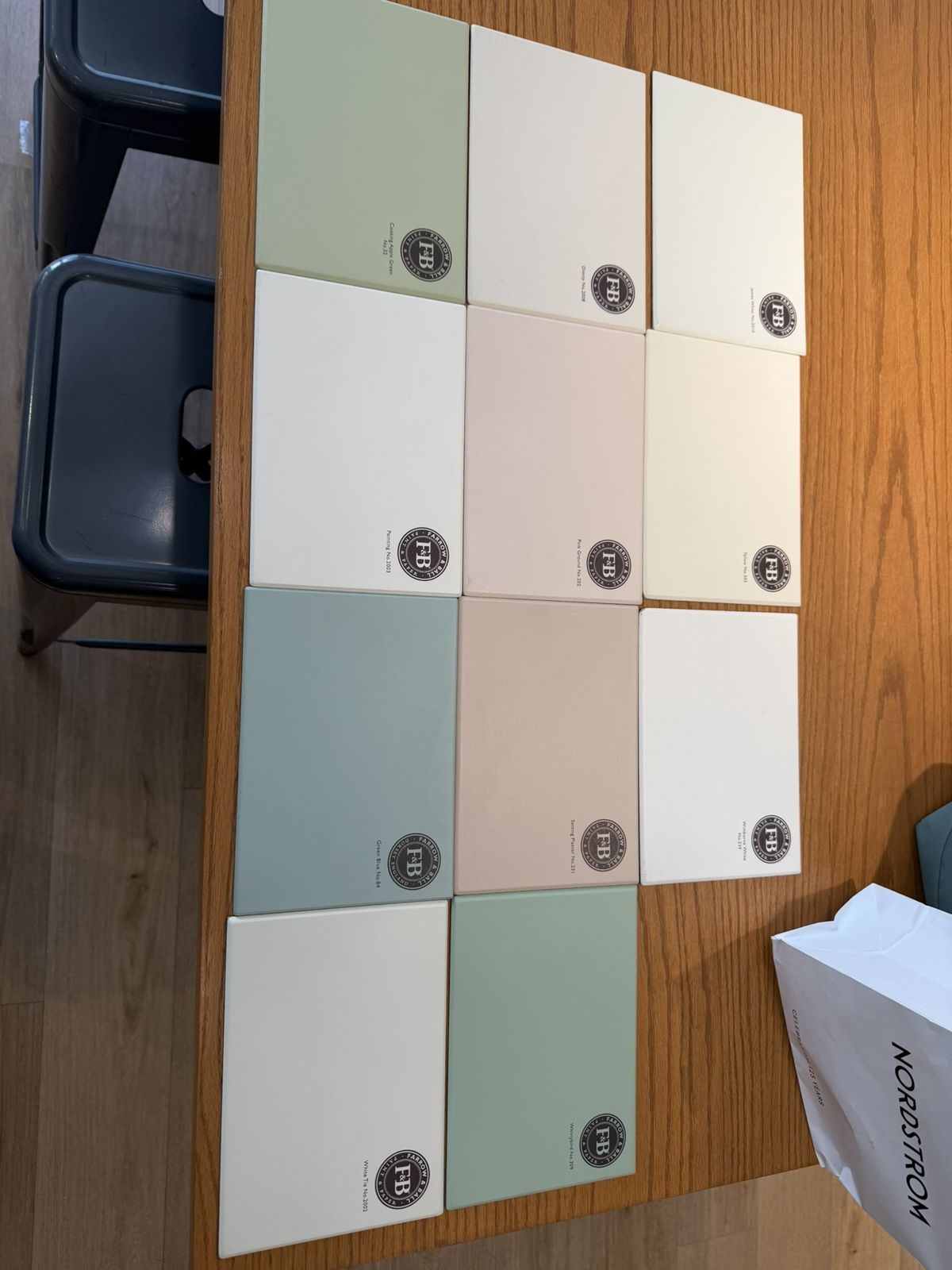 Farrow & Ball paint boards laid out on a table