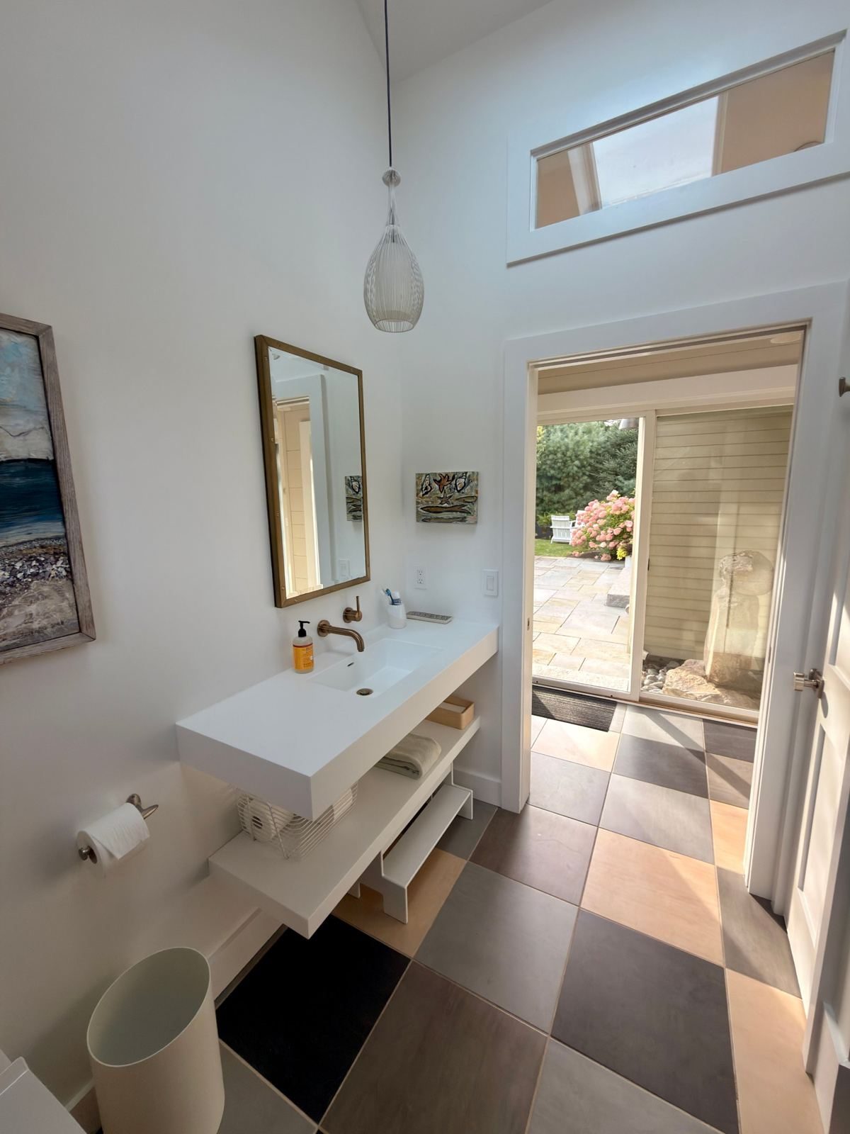 Bathroom opening to the stone patio